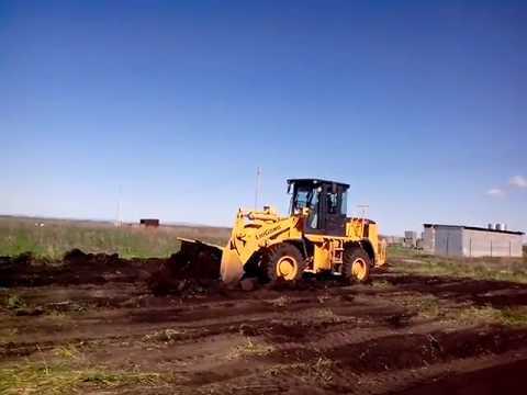 Как выбрать подходящую технику для снятия верхнего слоя грунта?