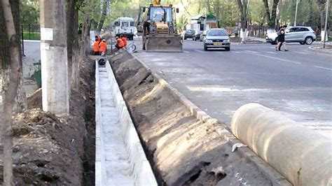 Влияние ливневой канализации на защиту дорожного покрытия и зданий