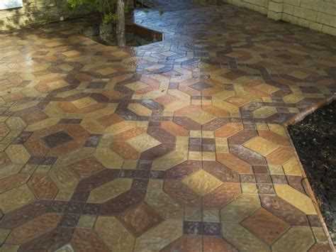 Укладка плитки на бетонную отмостку вокруг дома: пошаговое руководство