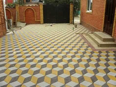 Техника укладки плитки на бетон с соблюдением зазоров и уровня