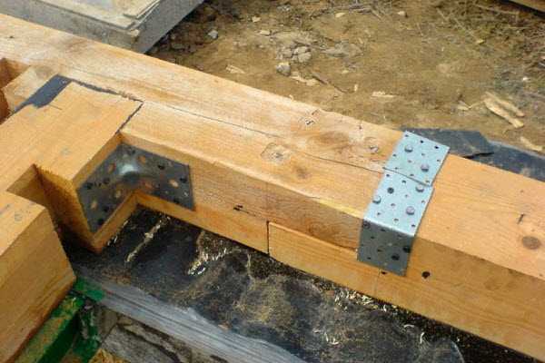 Технология установки анкерных болтов для фиксации бруса